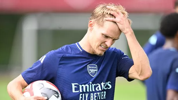 Martin Odegaard still ‘a long way’ from Arsenal return as absence compared to Man City star