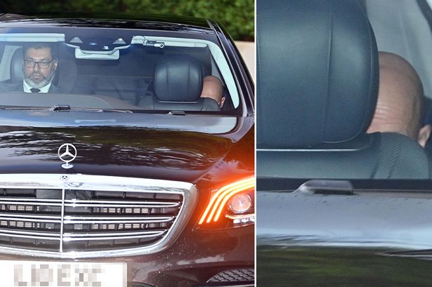 Erik ten Hag hides behind passenger seat as he returns to Holland after Man Utd sacking