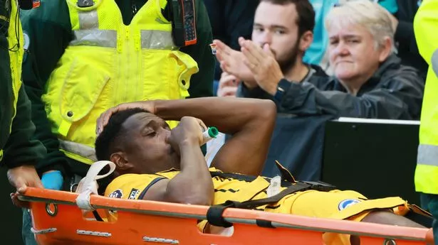 Danny Welbeck given oxygen and stretchered off after suffering back injury