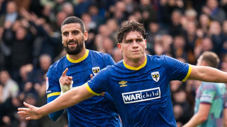 AFC Wimbledon romp to victory in first home game after pitch problems