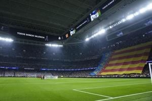 Real Madrid and AC Milan pay tribute to victims of deadly Valencia floods in Champions League match