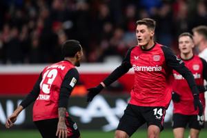 Schick hat trick helps Leverkusen cover defensive lapses. Frankfurt and Dortmund win in Bundesliga