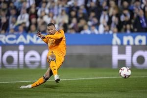 Mbappé scores as Madrid moves closer to Barcelona in Spanish league ahead of tough test at Liverpool