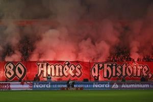 Lille says 2 fans stabbed when supporters were attacked ahead of Champions League game at Bologna