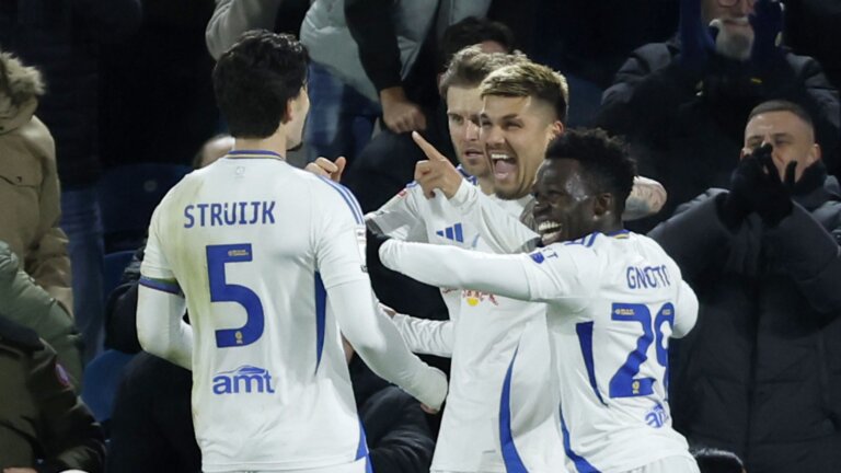 Leeds ease past Luton to take Championship top spot again