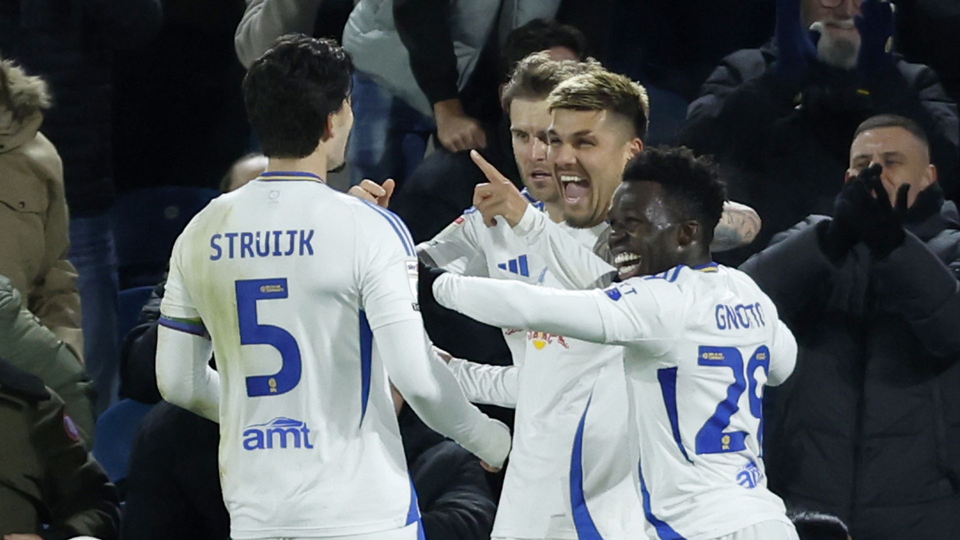 Leeds ease past Luton to take Championship top spot again