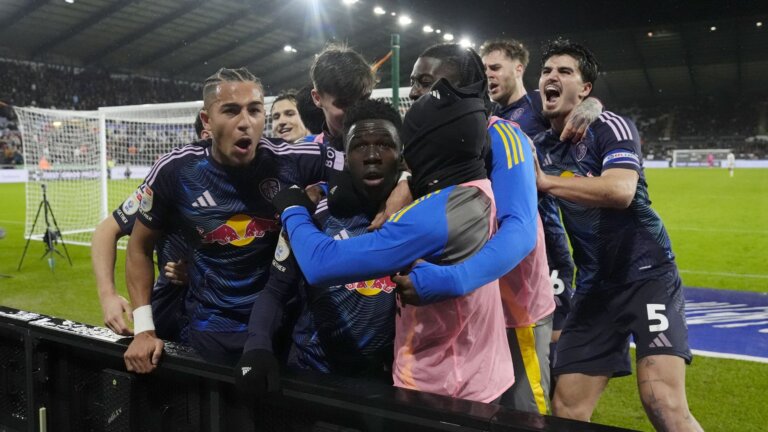 Leeds win seven-goal stunner at Swansea to go top of Championship