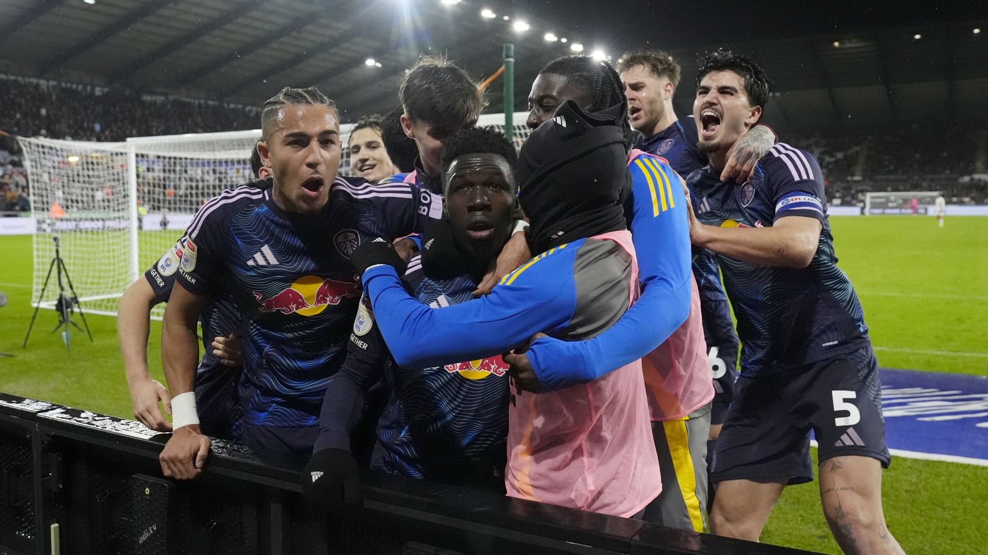 Leeds win seven-goal stunner at Swansea to go top of Championship