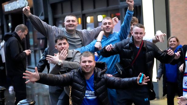Rangers fans descend on Manchester for Man Utd clash despite ‘do not travel’ warning