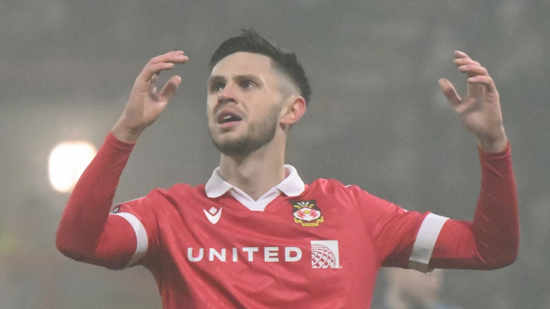 Wrexham suffer shock home defeat to lose ground in promotion race