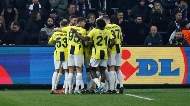 Europa League match suspended and players taken off as riot police rush into stands