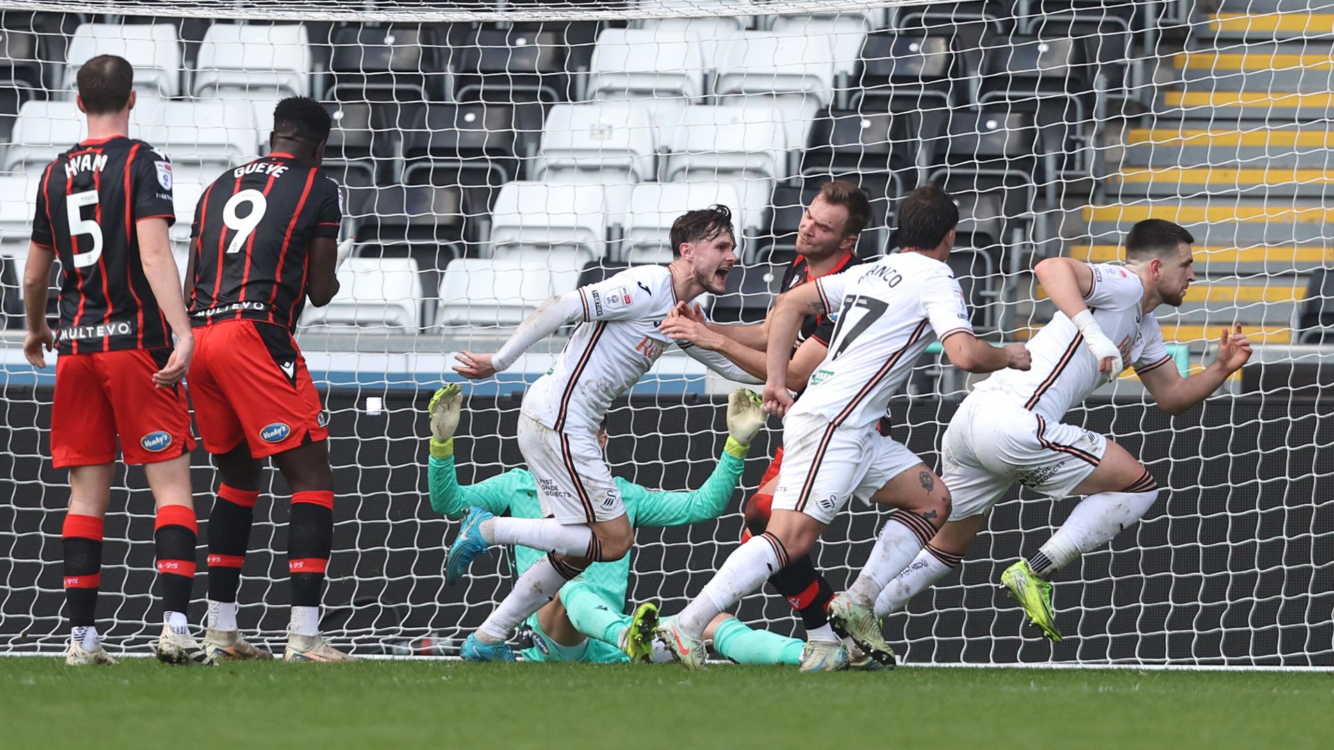 Managerless Swansea ease past Blackburn