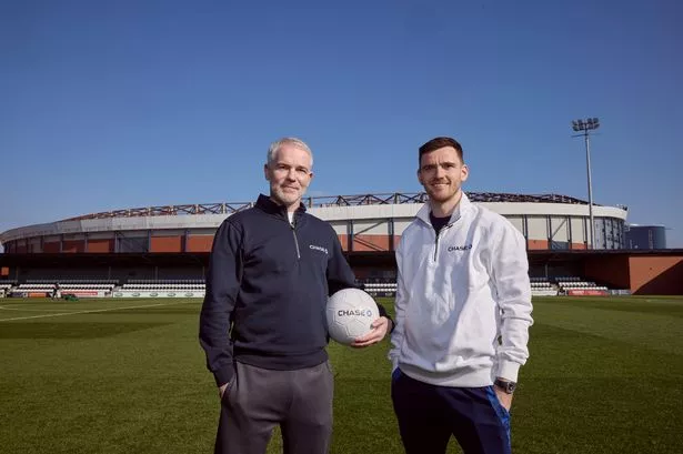 Andy Robertson reunites with inspirational mentor to celebrate impact of coaching on communities