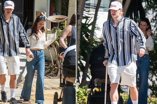 Erling Haaland OUT of protective boot as he relaxes in Spain with girlfriend and new baby