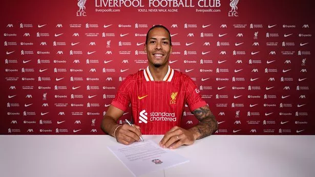 Virgil van Dijk signs new contract as Liverpool keep world’s best defender
