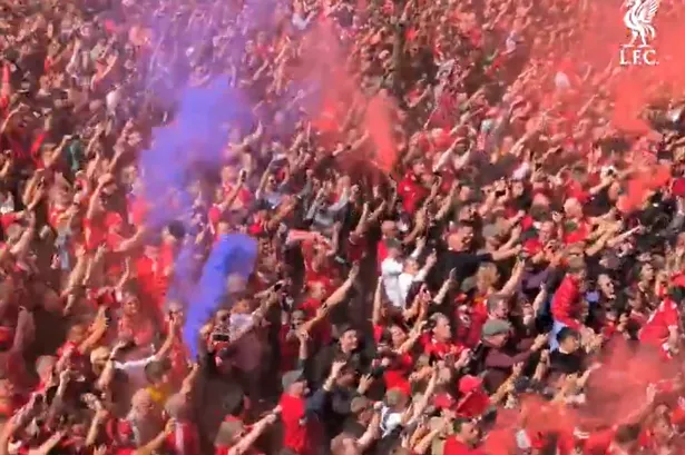 Why there were blue flares at Anfield as Liverpool celebrated historic title win