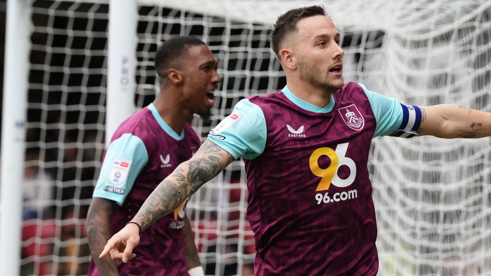 Burnley close in on promotion after win against nine-man Watford