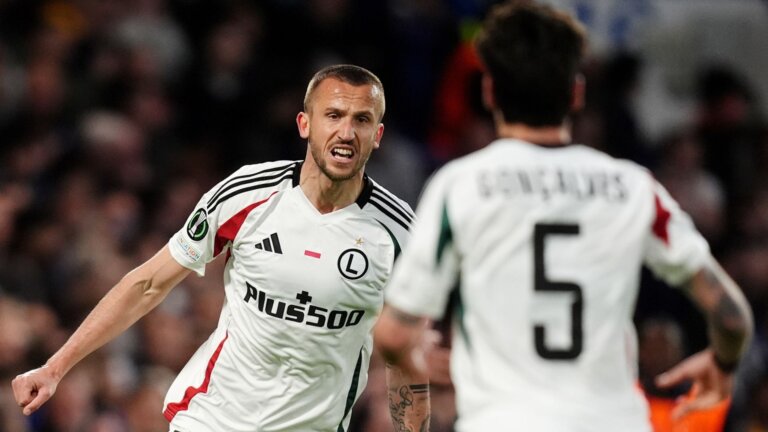 Unconvincing Chelsea beaten by Legia on night but through to UCL semis
