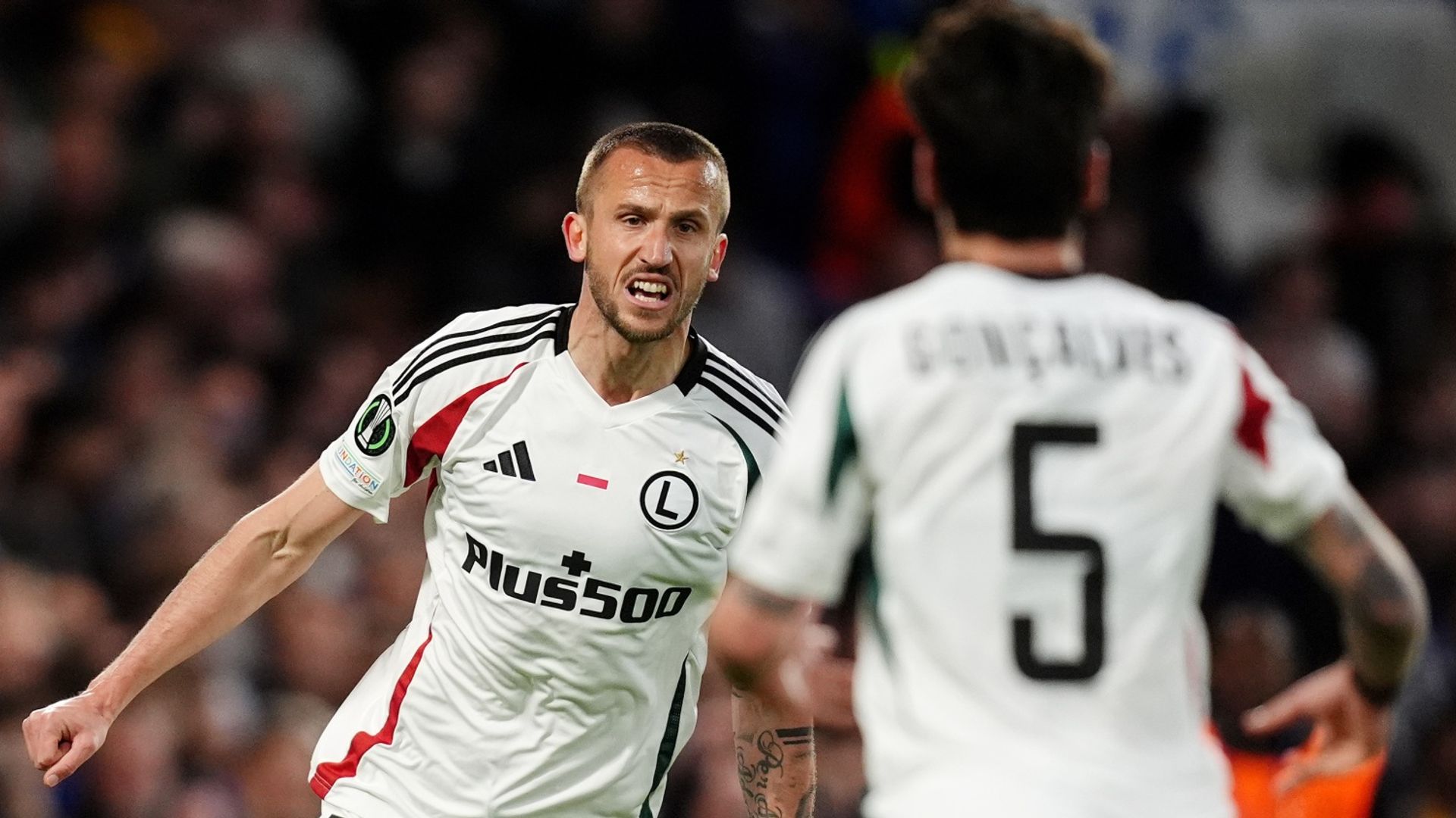 Unconvincing Chelsea beaten by Legia on night but through to UCL semis