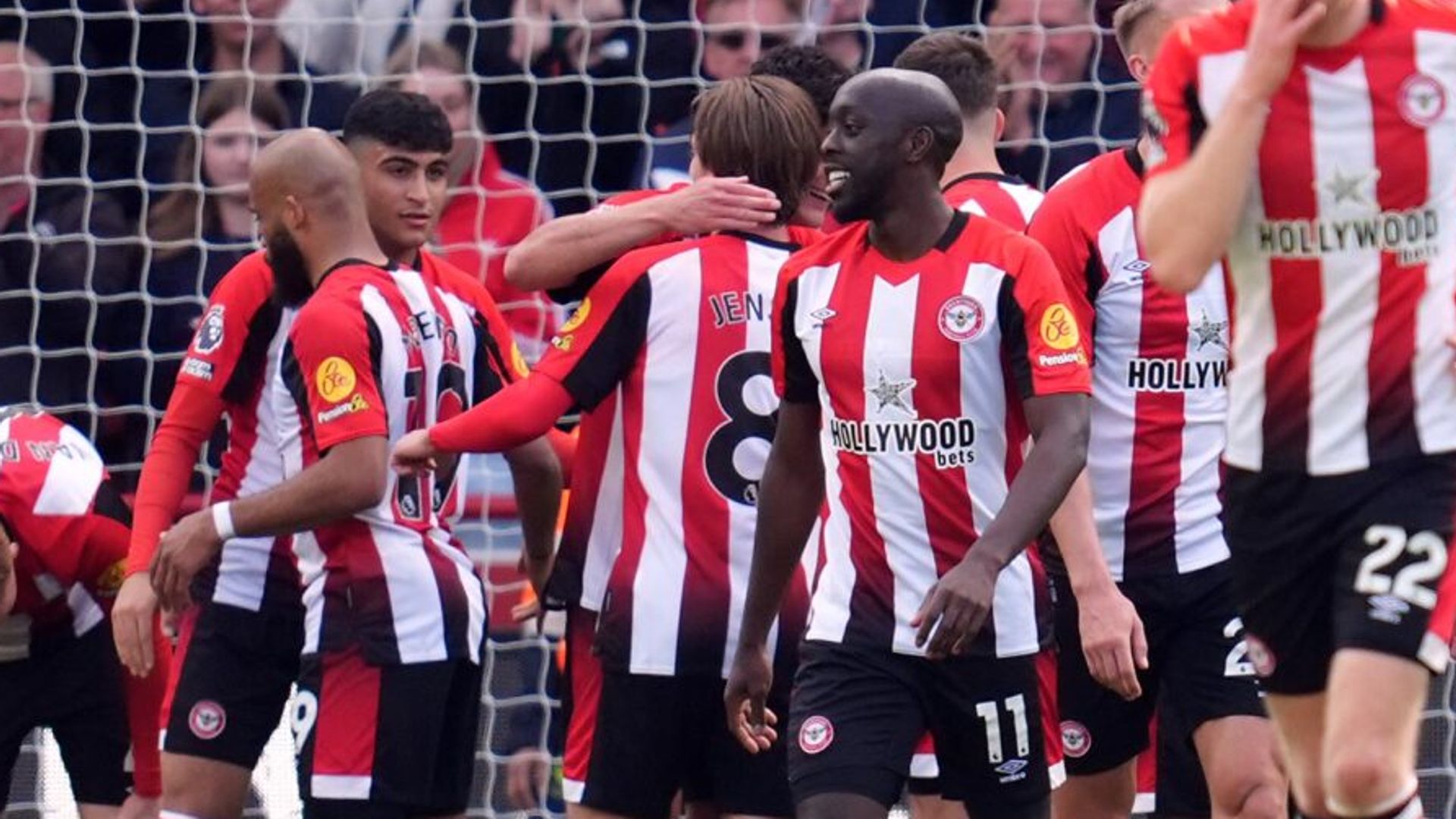 Brentford beat 10-player Brighton as Van Hecke stretchered off with head injury