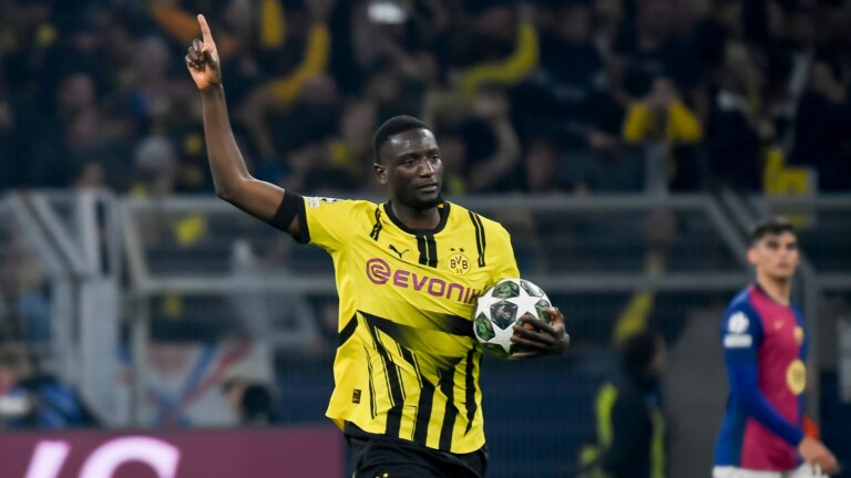 Guirassy hat-trick in vain for Dortmund as Barcelona advance to semis