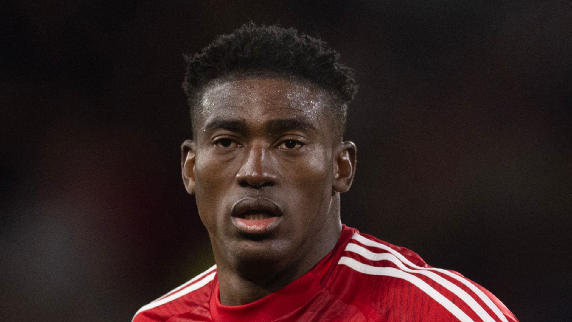Awoniyi in induced coma after abdominal surgery