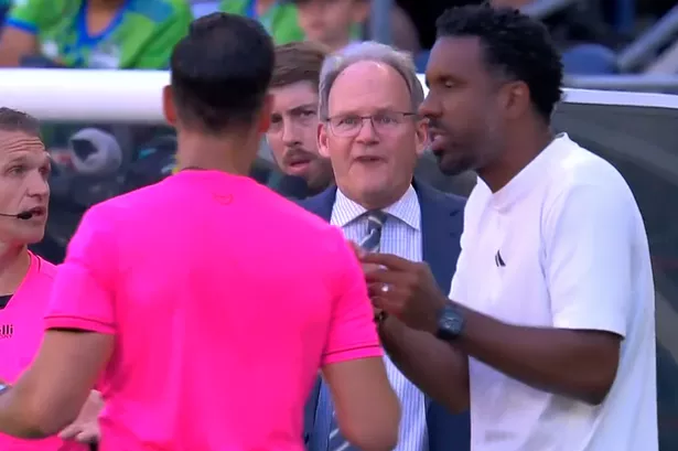 Manager screams at referee ‘stop the game’ as goalkeeper collapses with head injury