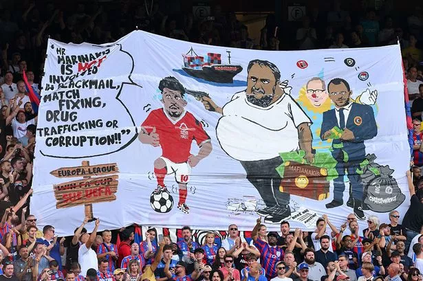 FA investigate banner showing Nottingham Forest owner holding gun to Morgan Gibbs-White’s head