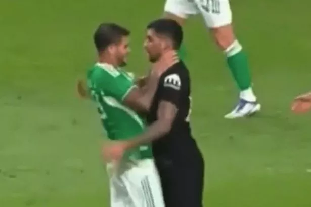Bruno Guimaraes puts hands around Cristian Romero’s THROAT as pair clash during friendly